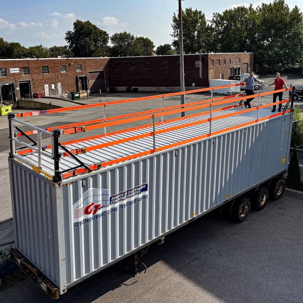 CubeRail provides fall protection on top of a converted shipping container.