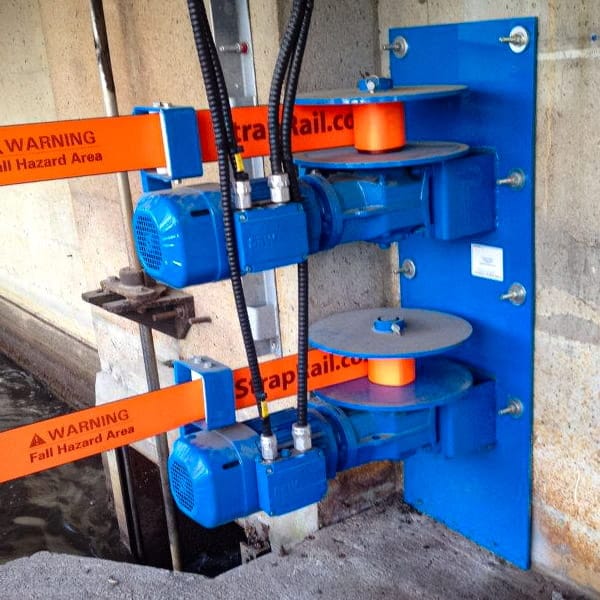 SpanRail winches automate strap deployment, retraction, and tensioning.